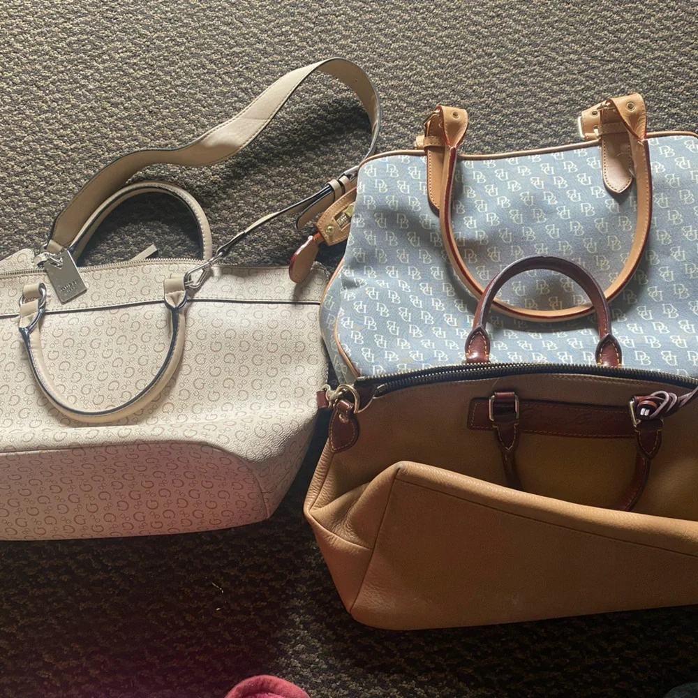Two Dooney and Burke purses, one Guess purse - Picture 1 of 3